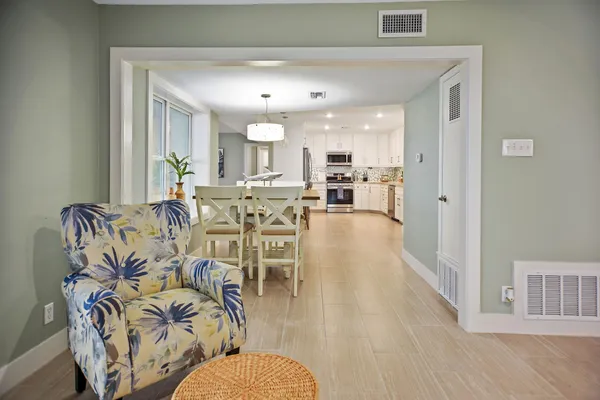 a view of a dining room with furniture