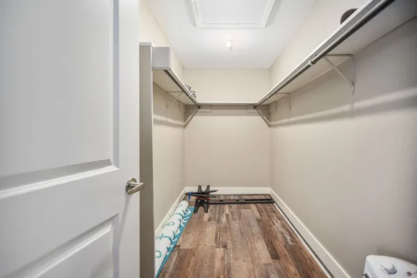 a view of a room with racks on the wall