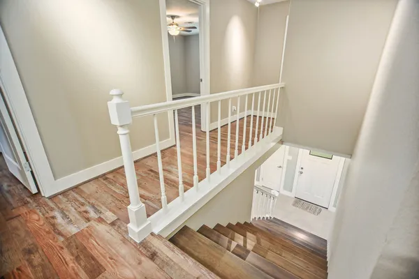 a view of entryway with wooden floor