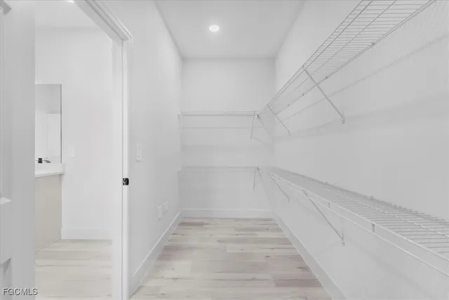 a view of a room with white walls