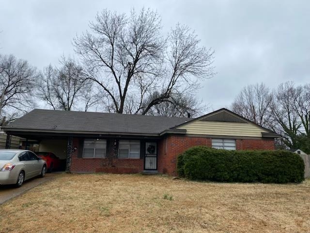 1707 Cherry Road Memphis, TN 38117 - Photo 1 of 1 a front view of a house with garden