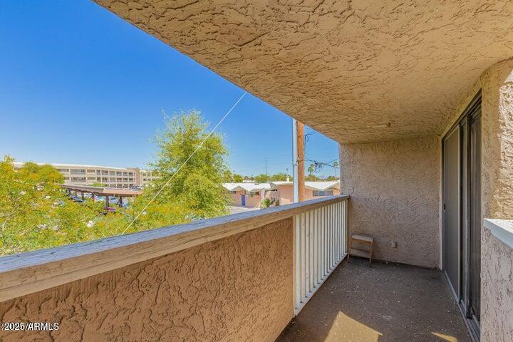 3030 North Hayden Road, Unit 16 Scottsdale, AZ 85251 - Photo 19 of 30 a view of balcony with furniture