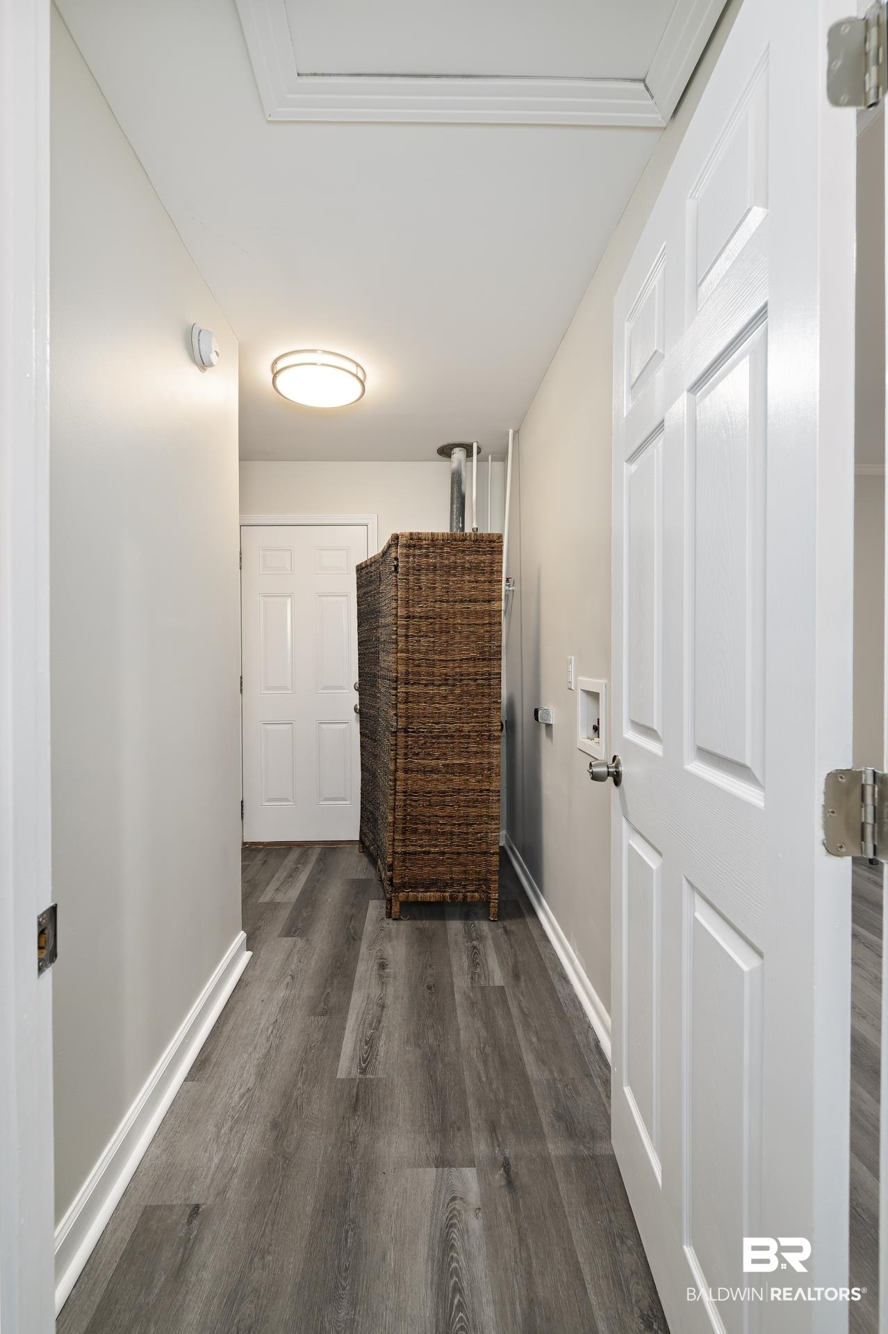 5922 Sunnyside Drive Mobile, AL 36619 - Photo 25 of 51 Hallway with dark wood-type flooring, baseboards, and crown molding
