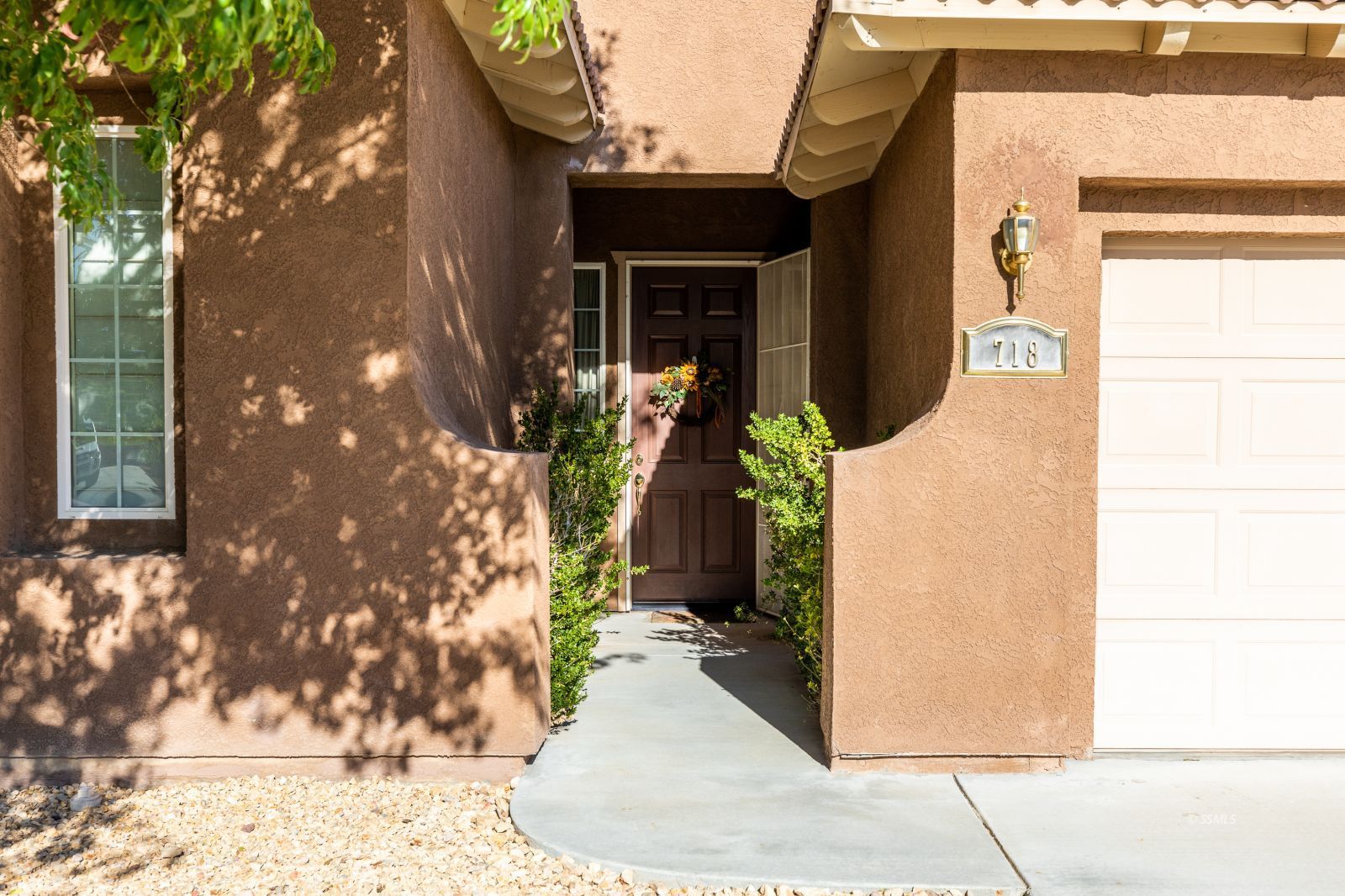 718 Pinon Court Ridgecrest, CA 93555 - Photo 3 of 41 a front view of a house with a yard