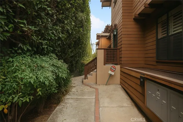 a view of a kitchen with a sink and a stove top oven