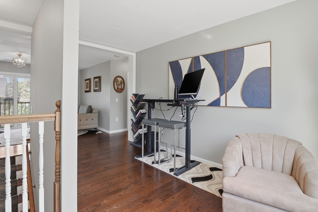 112 Pineland Avenue Worcester, MA 01604 - Photo 21 of 38 a living room with furniture and a flat screen tv