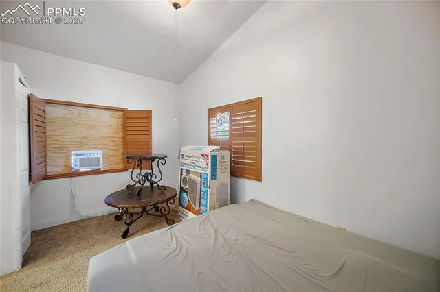 a room with furniture and a window