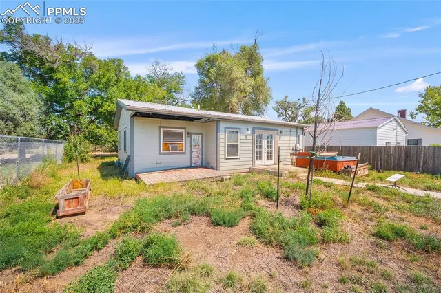 a house view with a garden space