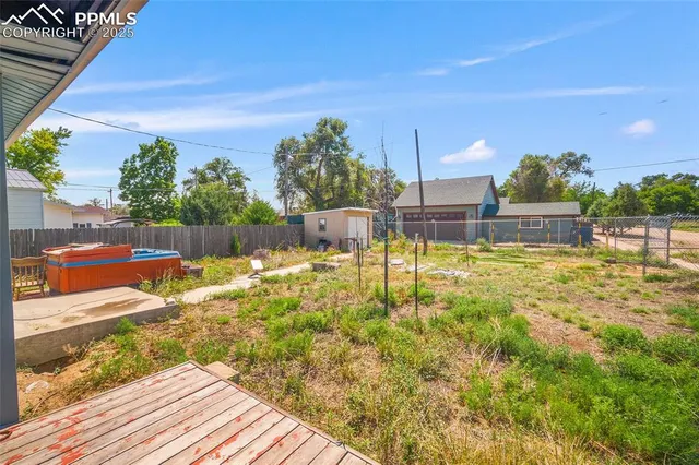 a view of a swimming pool with a patio
