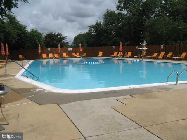 an outdoor space with a swimming pool