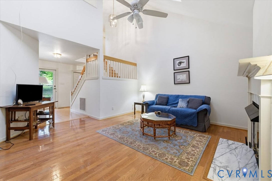 4099 Doe Run Road Hopewell, VA 23860 - Photo 20 of 36 Living area featuring high vaulted ceilings, light