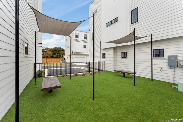 view of a brick building with a outdoor space