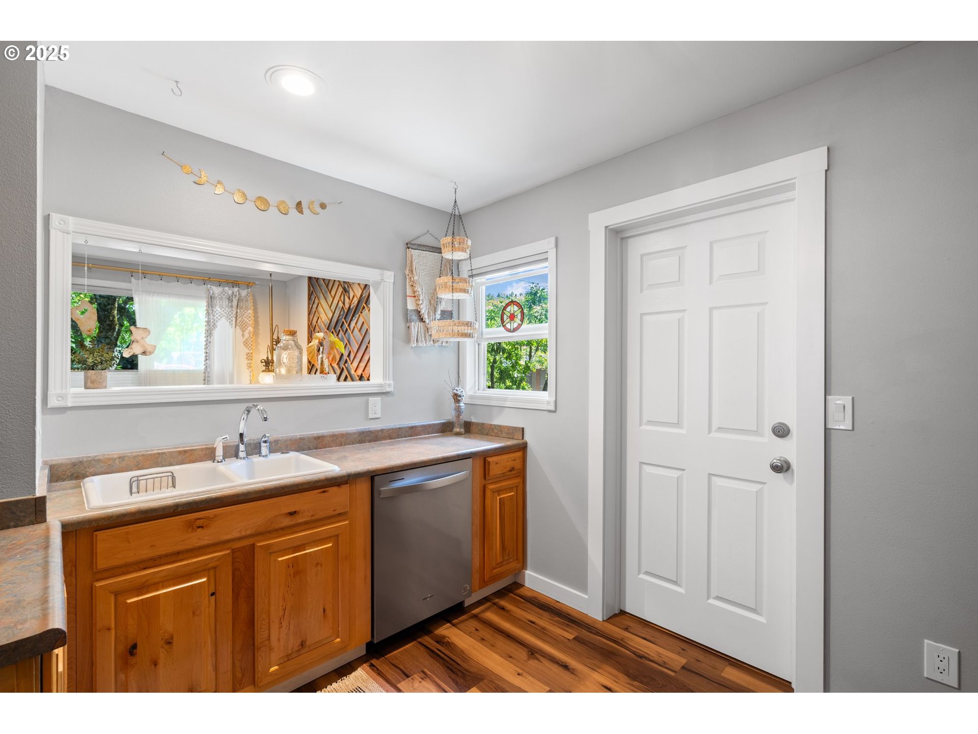 4517 Northeast 85th Avenue Portland, OR 97220 - Photo 12 of 38 a kitchen with a sink cabinets and window