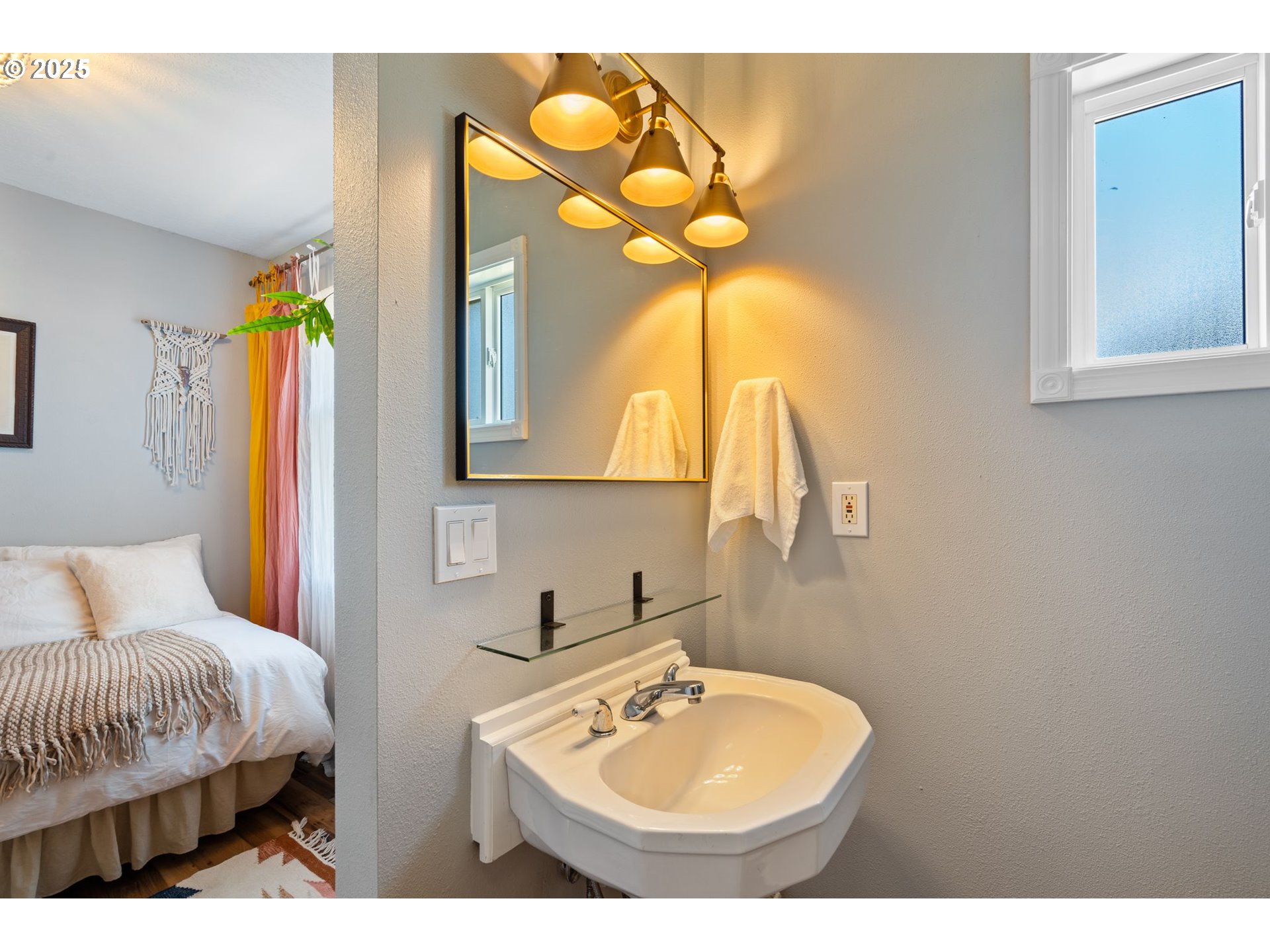 4517 Northeast 85th Avenue Portland, OR 97220 - Photo 17 of 38 a bathroom with a sink and a mirror