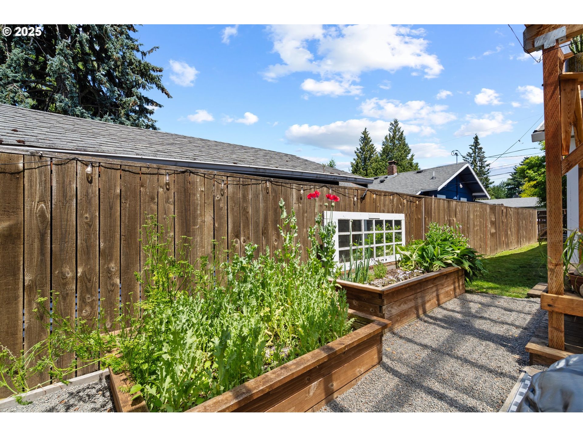 4517 Northeast 85th Avenue Portland, OR 97220 - Photo 28 of 38 a view of a backyard with garden