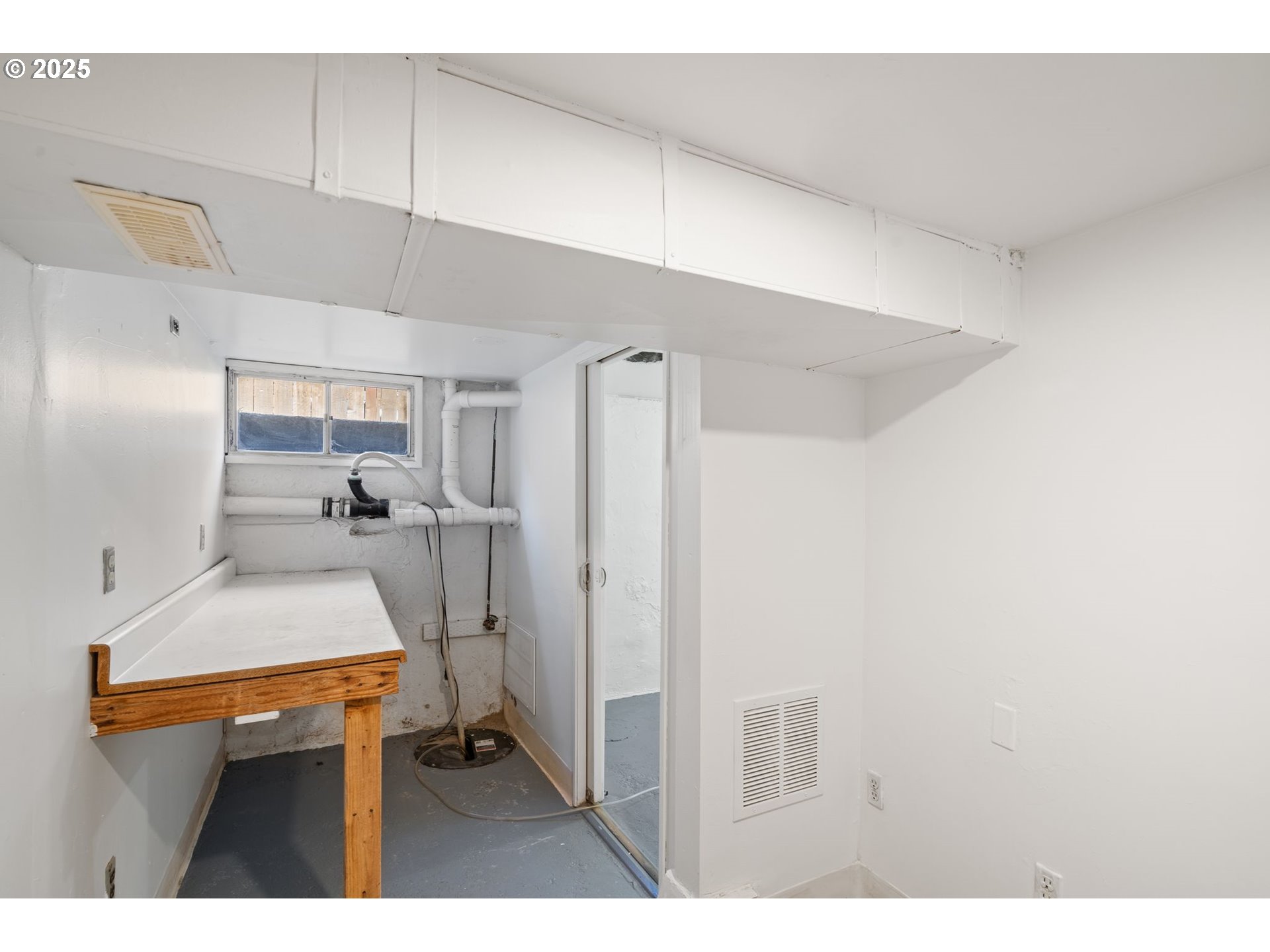 4517 Northeast 85th Avenue Portland, OR 97220 - Photo 36 of 38 a room with closet and mirror