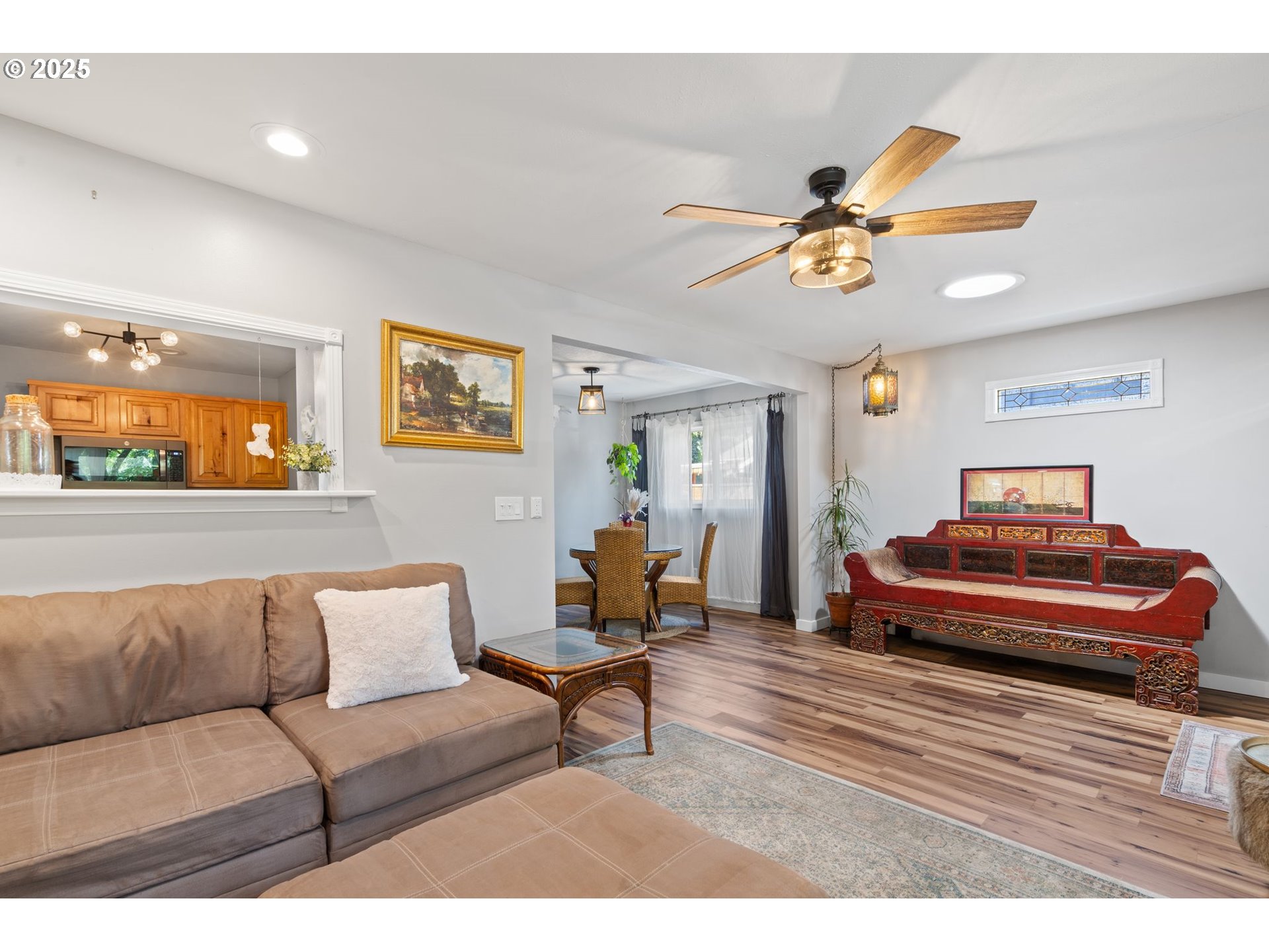 4517 Northeast 85th Avenue Portland, OR 97220 - Photo 5 of 38 a bedroom with a bed and wooden floor
