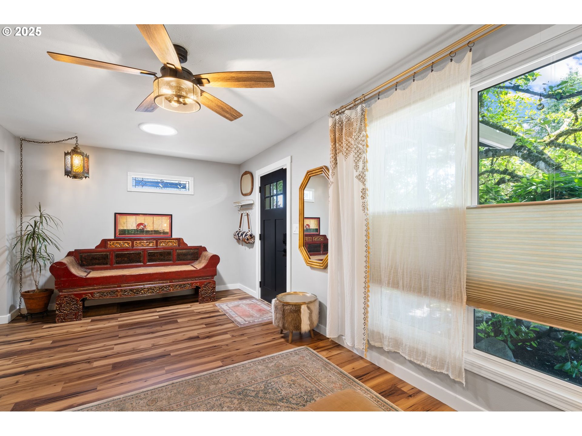 4517 Northeast 85th Avenue Portland, OR 97220 - Photo 8 of 38 a bedroom with a bed and wooden floor