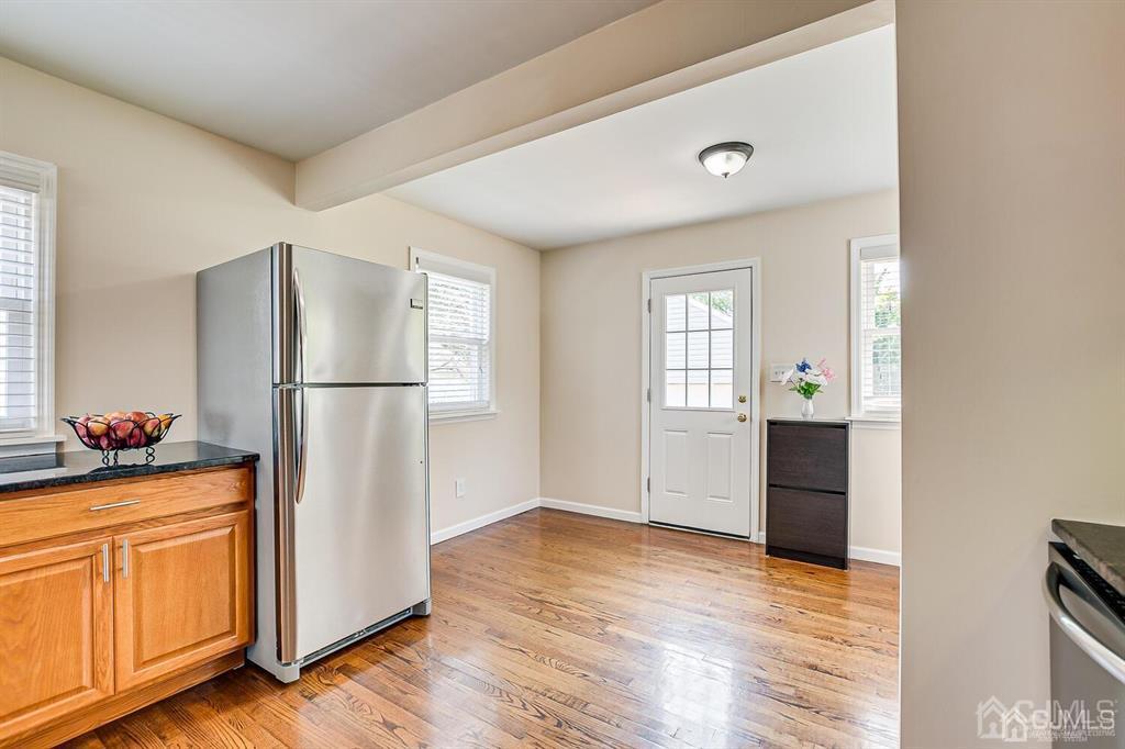 119 Wagner Street Edison, NJ 08837 - Photo 14 of 41 a kitchen with a refrigerator and a stove top oven