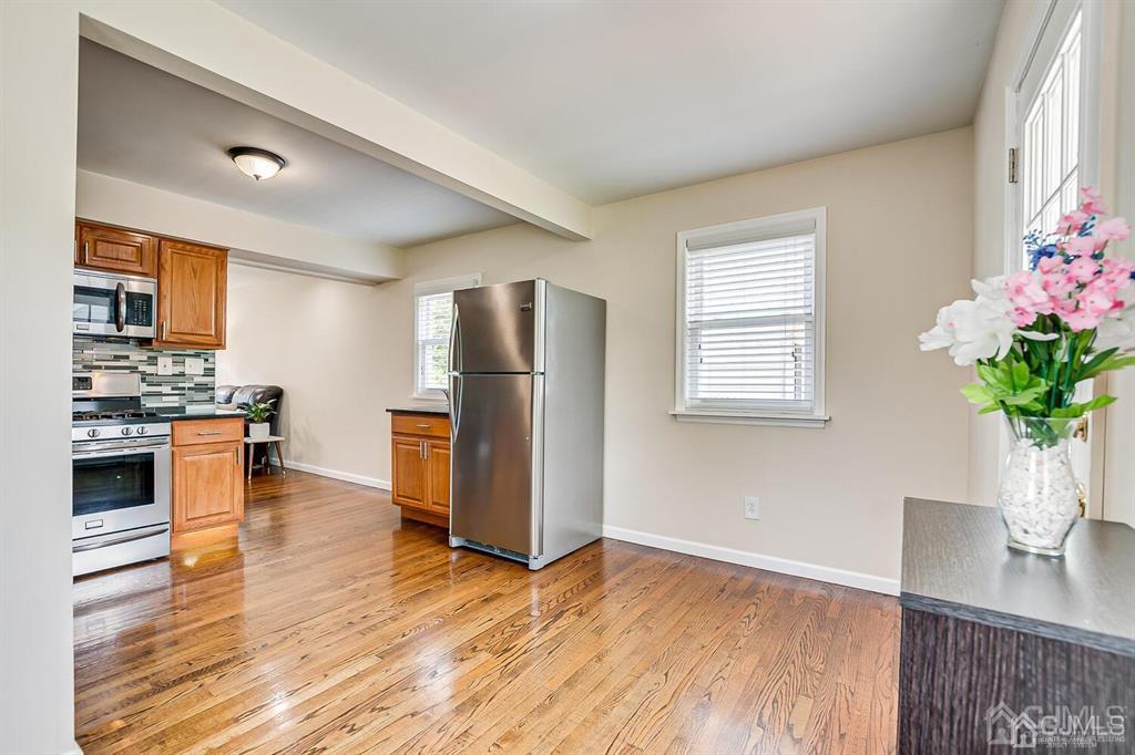 119 Wagner Street Edison, NJ 08837 - Photo 18 of 41 a kitchen with granite countertop stainless steel appliances a counter top space and cabinets
