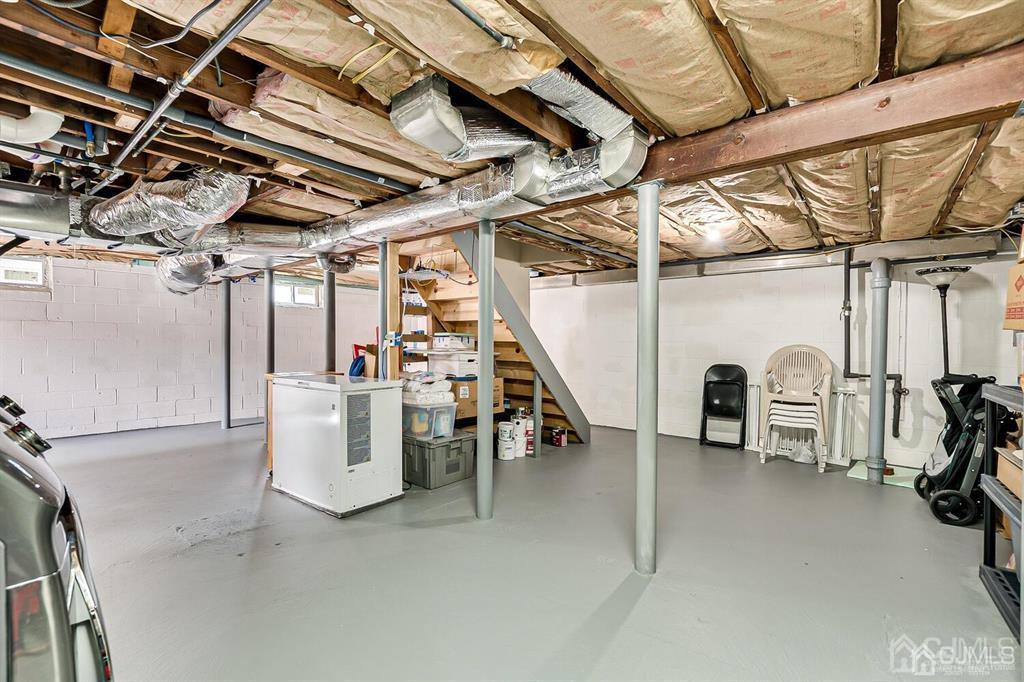 119 Wagner Street Edison, NJ 08837 - Photo 34 of 41 a view of a storage room with stairs