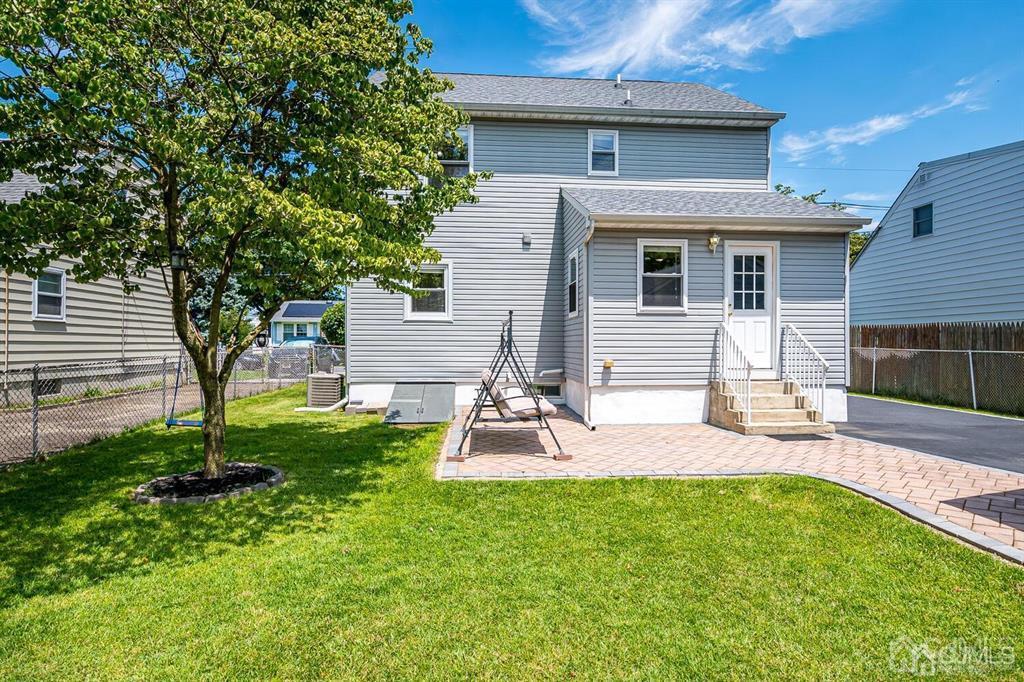 119 Wagner Street Edison, NJ 08837 - Photo 36 of 41 a view of a backyard with a patio