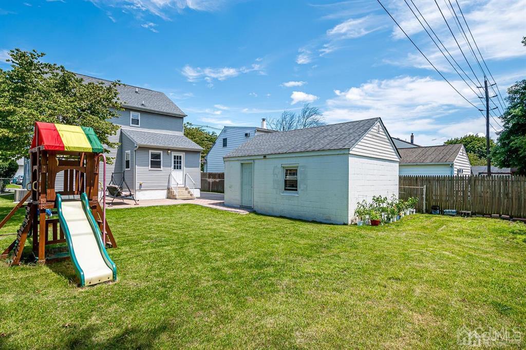 119 Wagner Street Edison, NJ 08837 - Photo 37 of 41 a view of a house with a yard