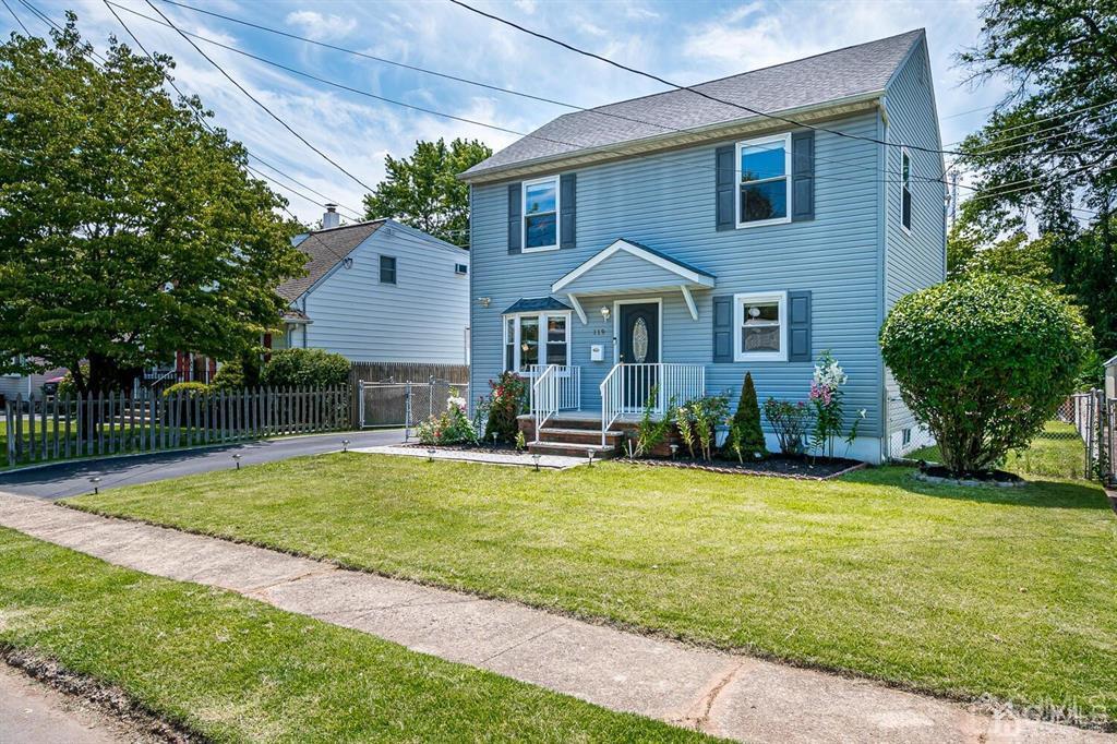 119 Wagner Street Edison, NJ 08837 - Photo 6 of 41 a front view of a house with a yard garage and outdoor seating