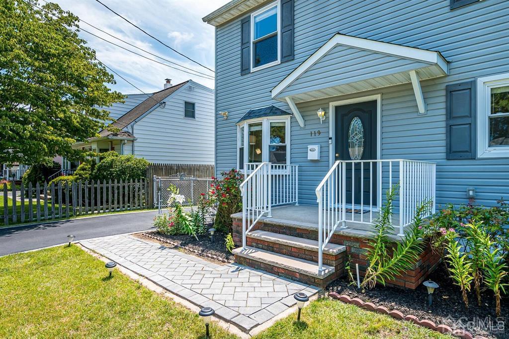 119 Wagner Street Edison, NJ 08837 - Photo 7 of 41 a view of a house with backyard and wooden fence