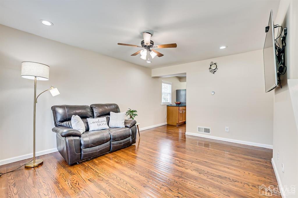 119 Wagner Street Edison, NJ 08837 - Photo 9 of 41 a living room with furniture and a ceiling fan