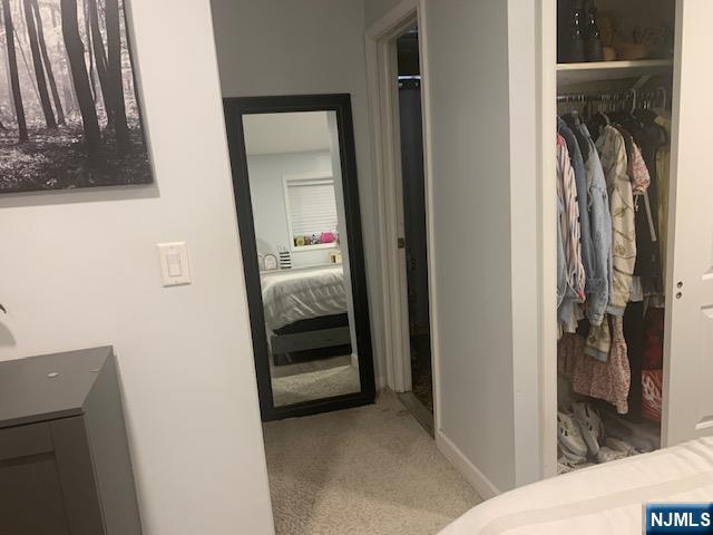 414 7th Street Fairview, NJ 07022 - Photo 4 of 6 a view of a bedroom from a hallway