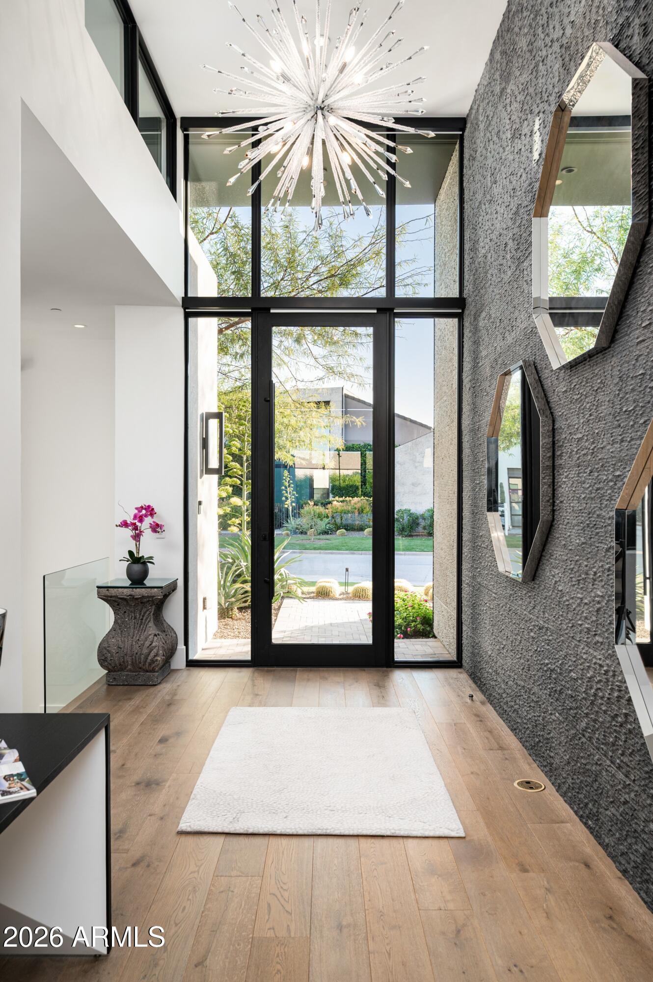 6914 East Cactus Wren Road Paradise Valley, AZ 85253 - Photo 4 of 38 a view of livingroom with furniture and a floor to ceiling window