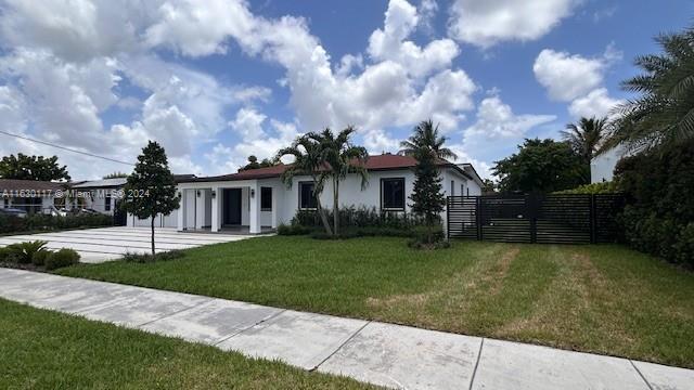 2825 Southwest 79th Court Miami, FL 33155 - Photo 2 of 20 a front view of a house with garden