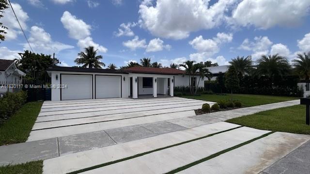 2825 Southwest 79th Court Miami, FL 33155 - Photo 3 of 20 a view of house with yard and entertaining space