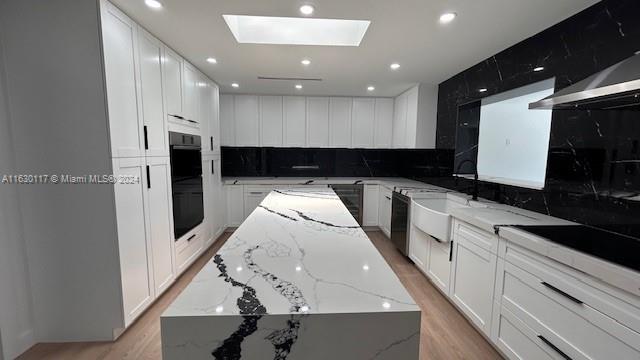 2825 Southwest 79th Court Miami, FL 33155 - Photo 8 of 20 a kitchen with a sink and refrigerator