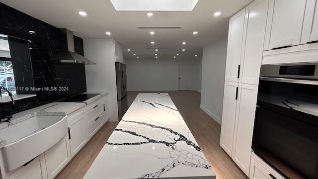 2825 Southwest 79th Court Miami, FL 33155 - Photo 10 of 20 a large white kitchen with stainless steel appliances and a refrigerator