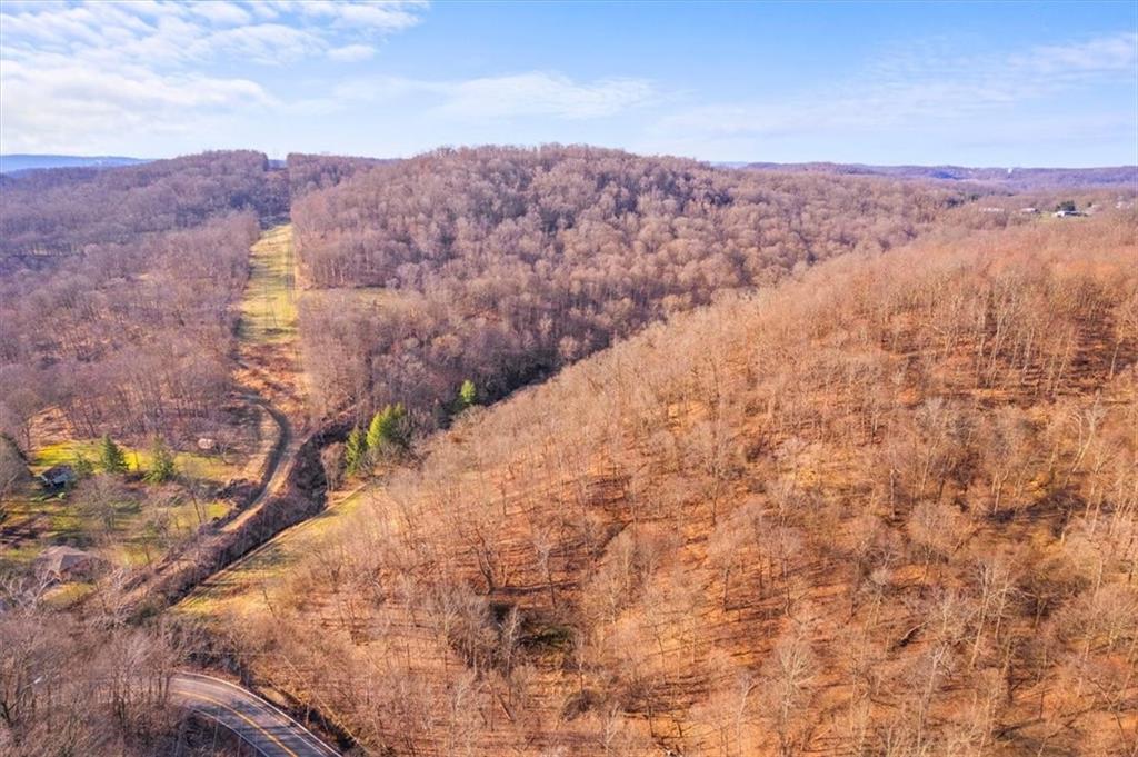 915 Baileys Run Road Tarentum, PA 15084 - Photo 6 of 13 a view of a dry yard with mountains in the background