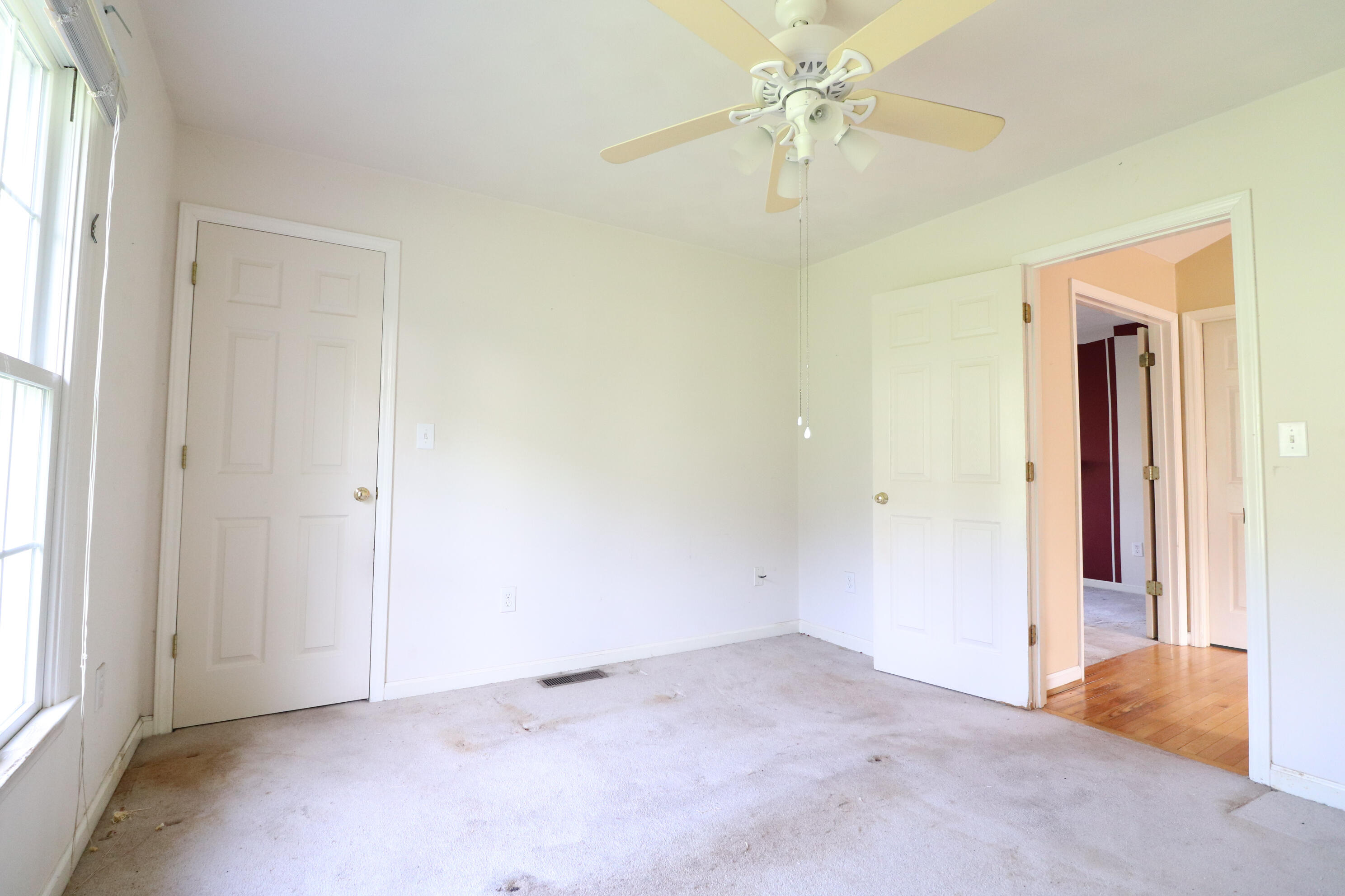 5630 Spring Meadow Drive Roanoke, VA 24018 - Photo 12 of 19 an empty room with fan and windows