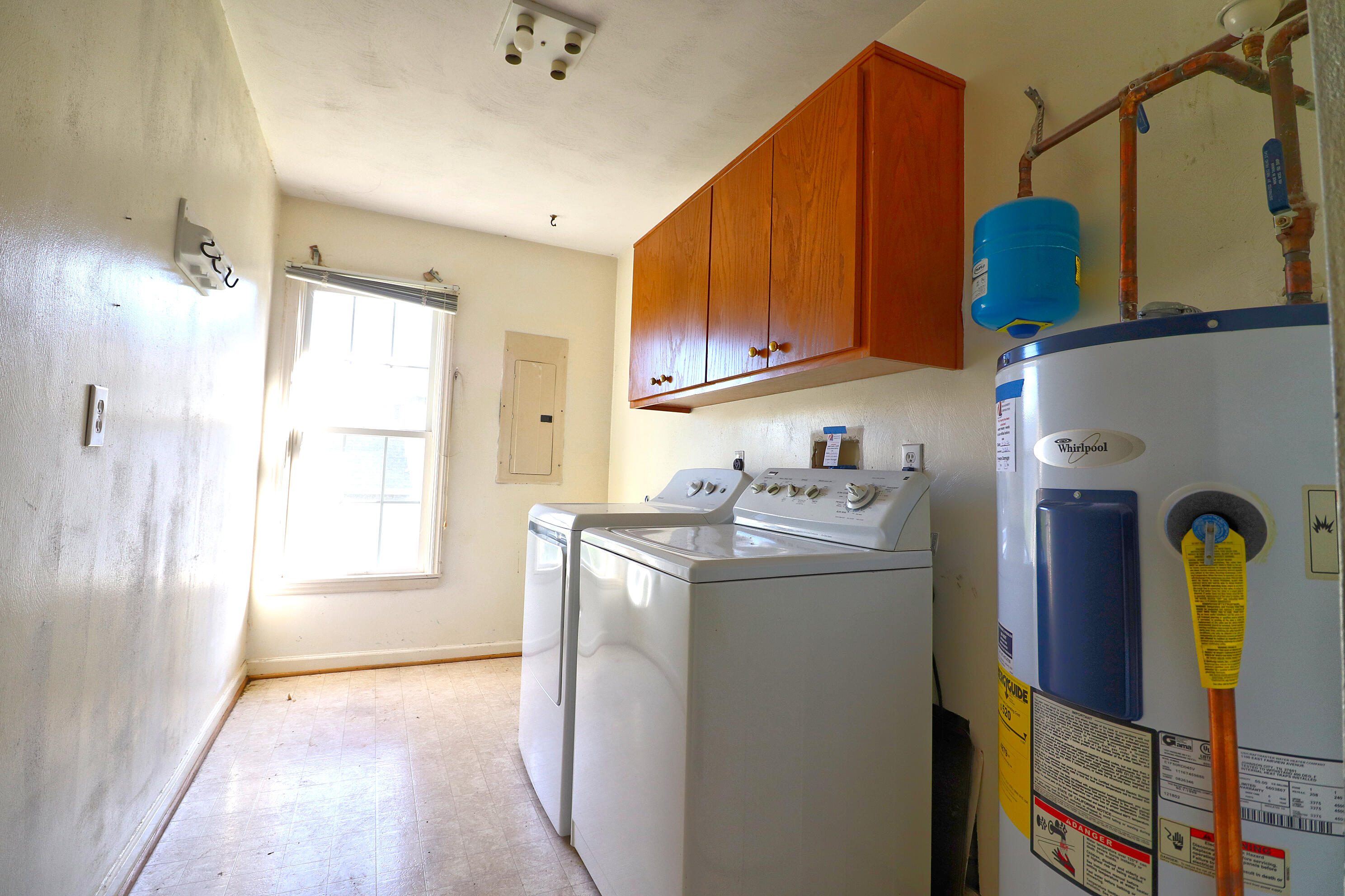 5630 Spring Meadow Drive Roanoke, VA 24018 - Photo 15 of 19 a kitchen with a refrigerator and window