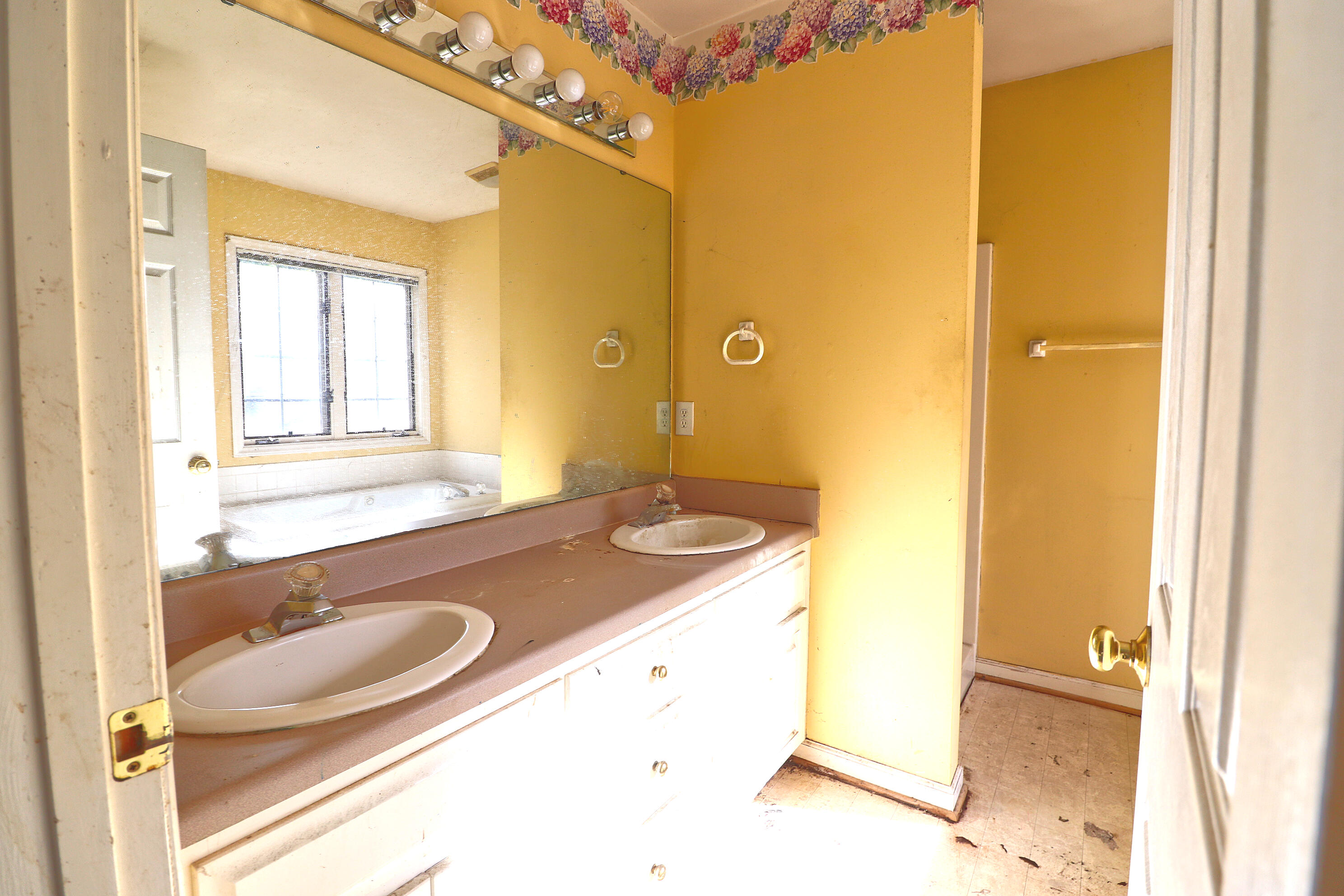 5630 Spring Meadow Drive Roanoke, VA 24018 - Photo 16 of 19 a bathroom with a granite countertop sink and mirror with bathtub