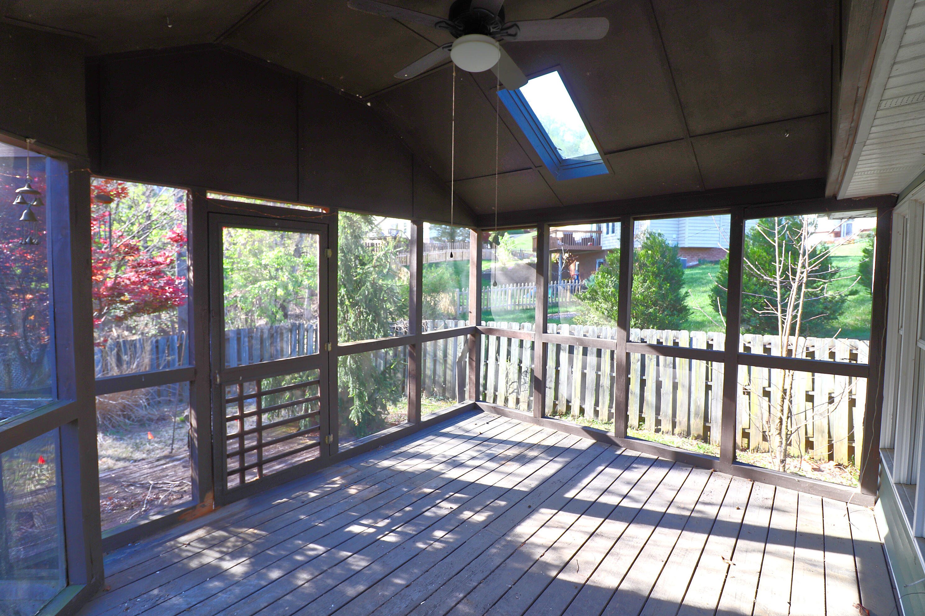 5630 Spring Meadow Drive Roanoke, VA 24018 - Photo 4 of 19 a view of a porch with wooden floor