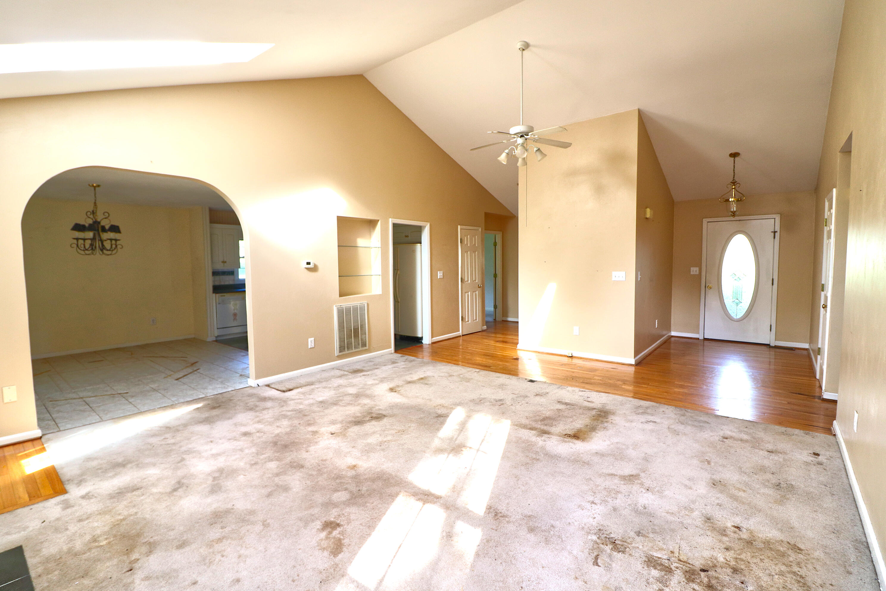 5630 Spring Meadow Drive Roanoke, VA 24018 - Photo 6 of 19 a view of a livingroom with wooden floor and a large window