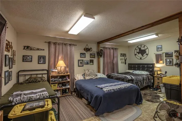 a view of a house with backyard and porch