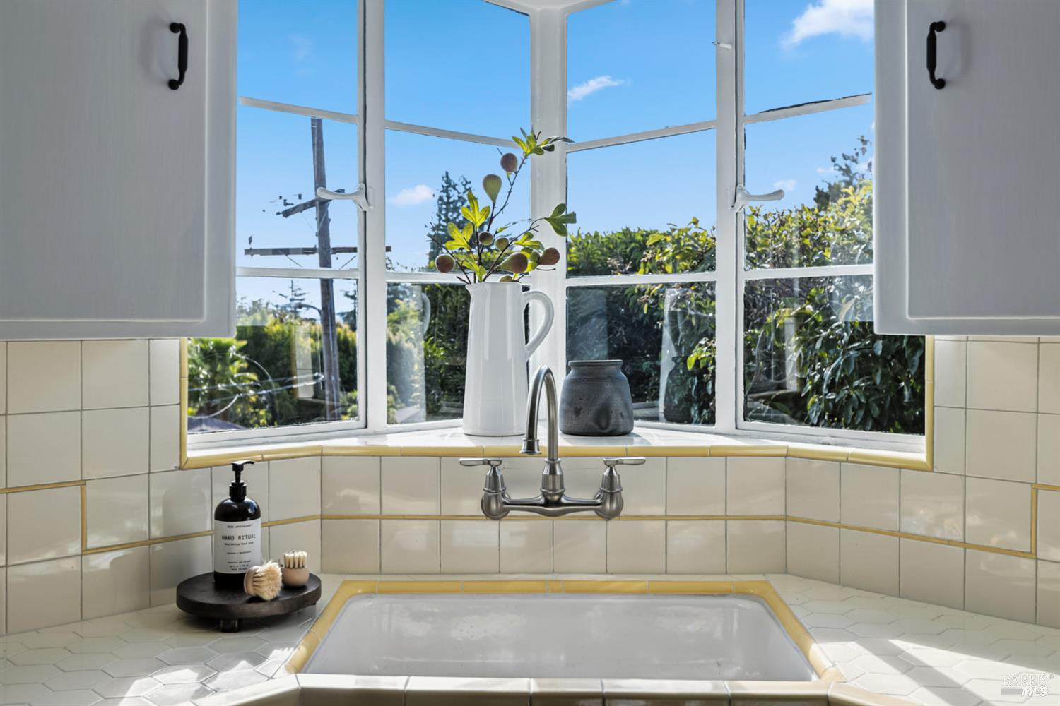 21 Marina Boulevard San Rafael, CA 94901 - Photo 12 of 38 a kitchen with a sink and window