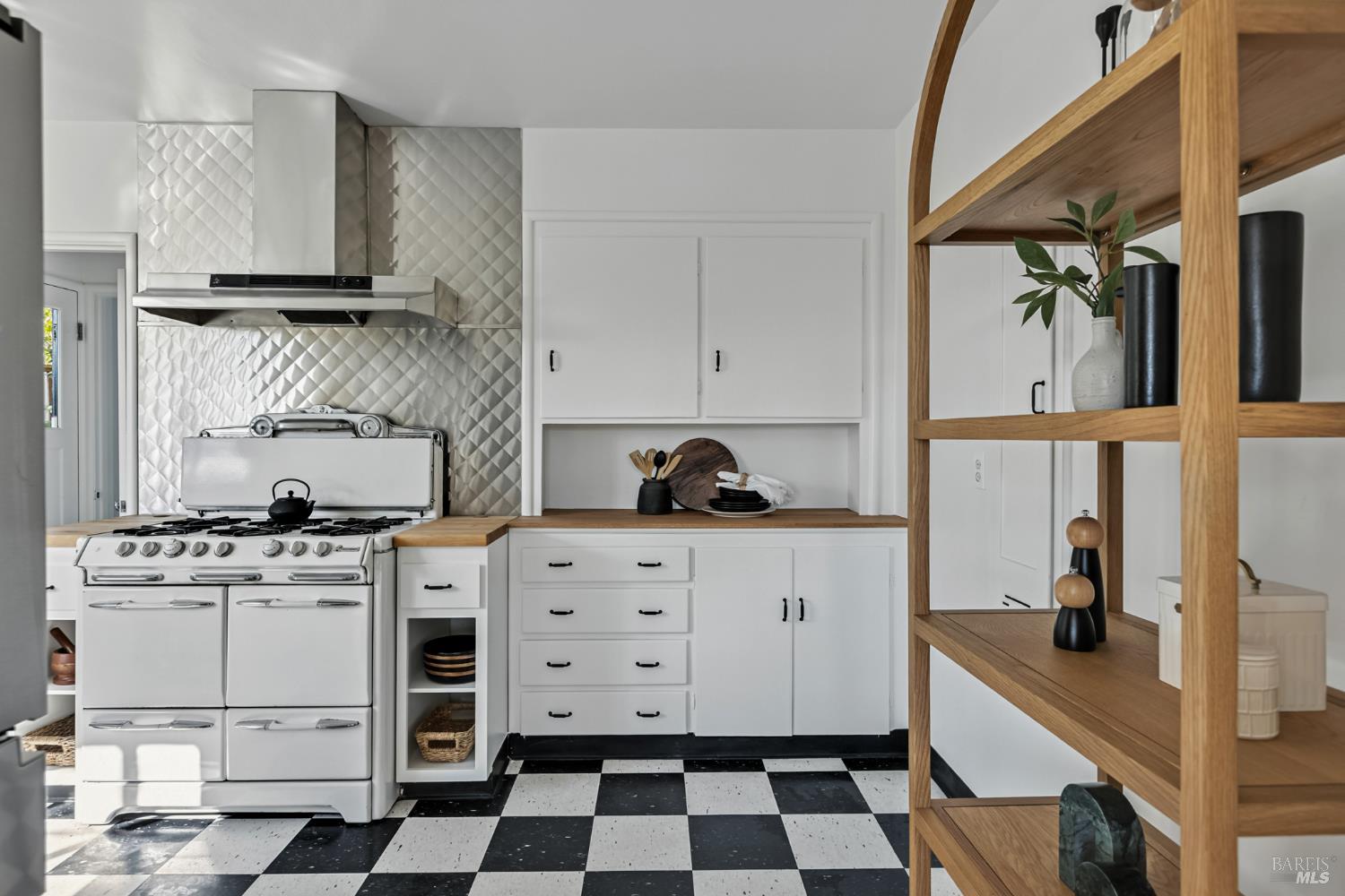 21 Marina Boulevard San Rafael, CA 94901 - Photo 14 of 38 a kitchen with a stove and a sink