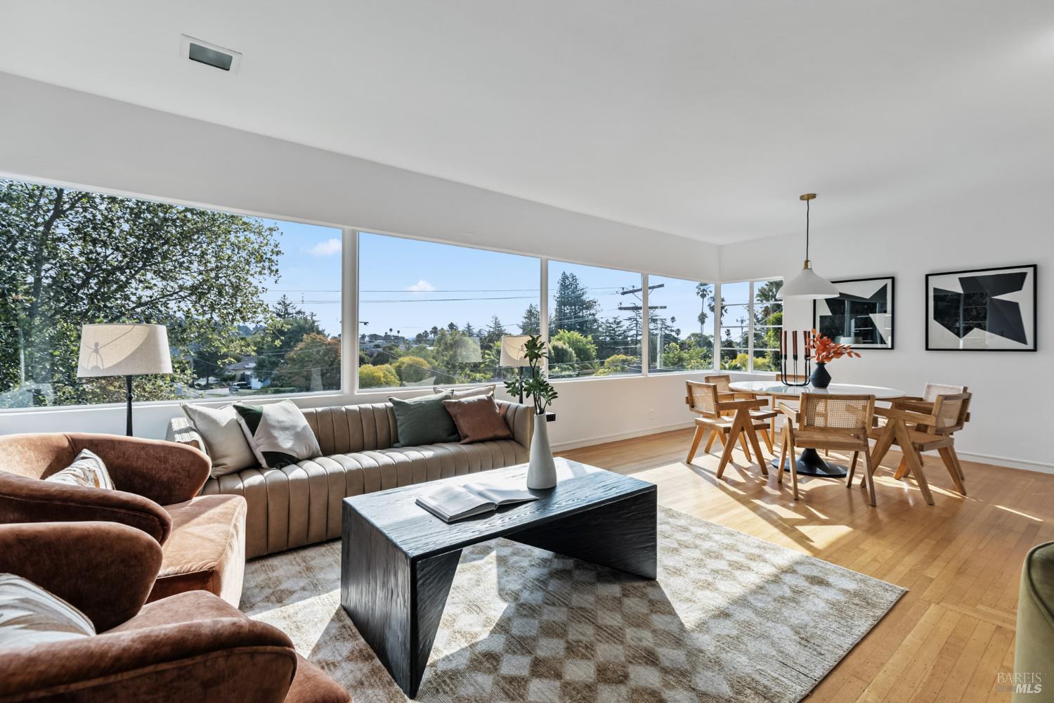 21 Marina Boulevard San Rafael, CA 94901 - Photo 8 of 38 a living room with furniture and a large window