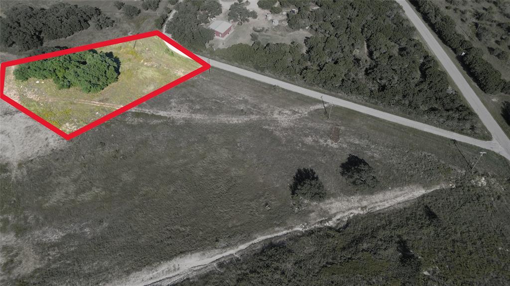 4342 Chicken Gristle Road Granbury, TX 76048 - Photo 3 of 7 a view of a back yard of a house