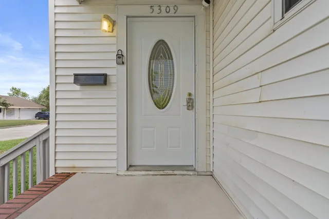 a view of a entryway door of the house