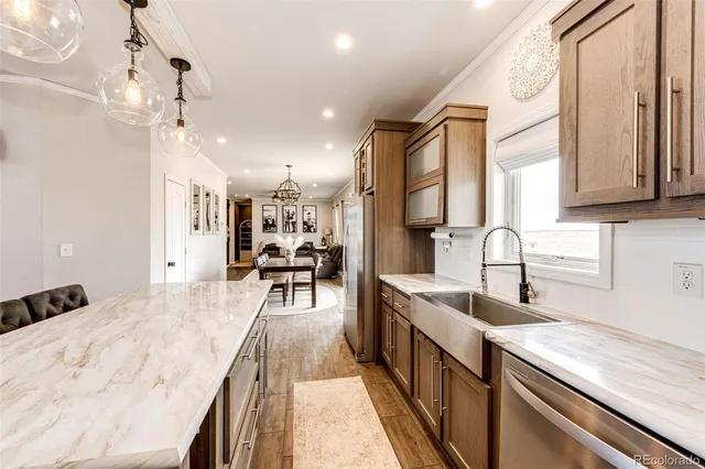 $705,000 | 977 South County Road 149, Strasburg, CO 80136