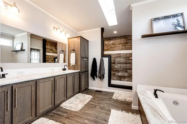 $705,000 | 977 South County Road 149, Strasburg, CO 80136